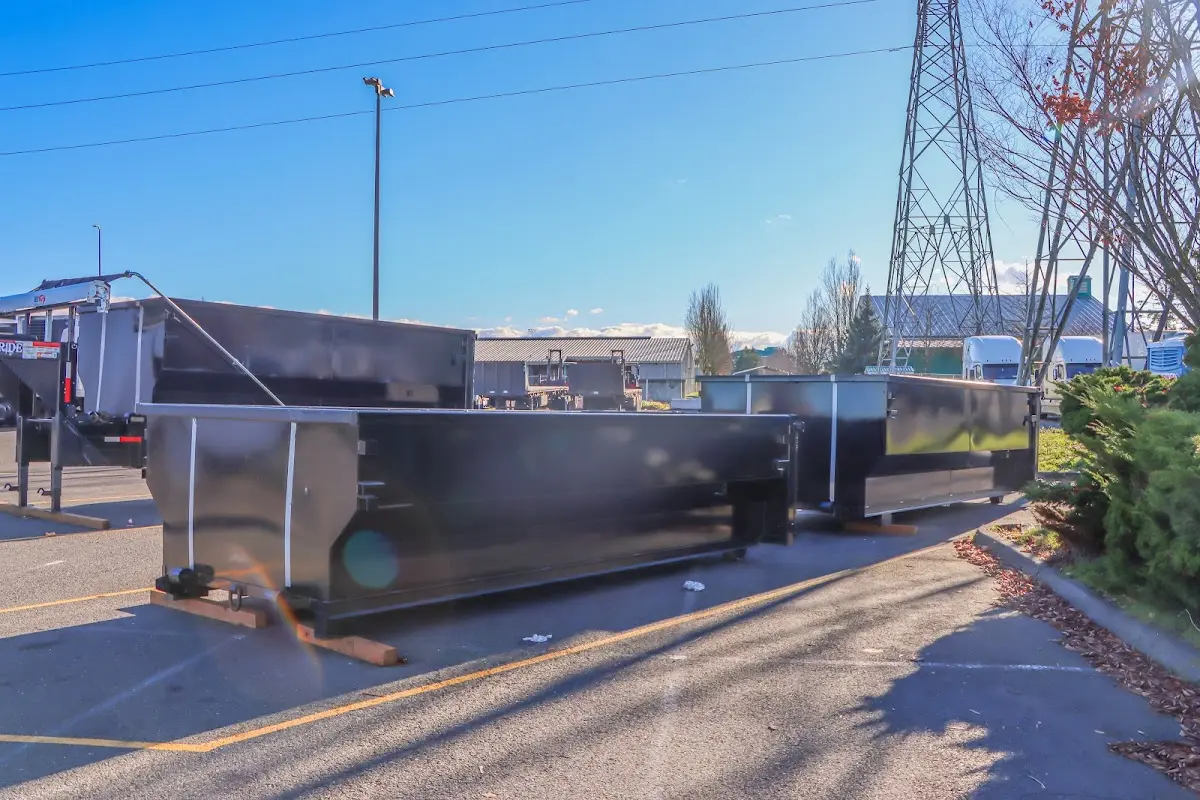 Roll-off dumpster ready for waste disposal at job site for Concrete Dumpster Rental in Elmwood